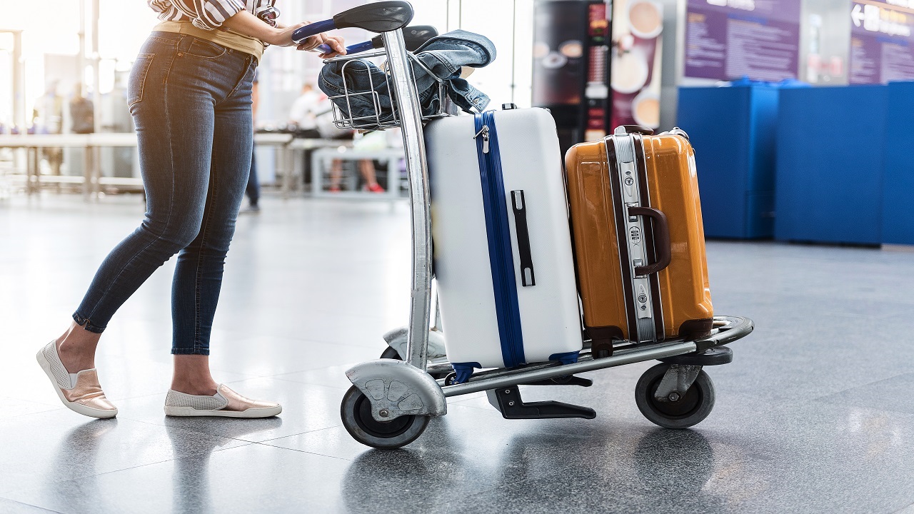 A woman with this luggage in an airport.  Photo: iStock