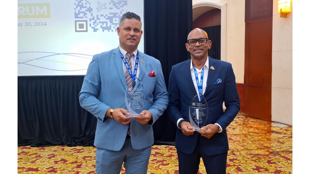 Richard Moss, Senior Sales manager of the St Lucia Tourism Authority, (left) and Paul Collymore, President of the St Lucia Hospitality and Tourism Association after receiving the Caribbean Destination Resilience Awards at the 2024 Caribbean Travel Marketplace in Montego Bay, Jamaica on May 20. Photo: Dillon De Shong