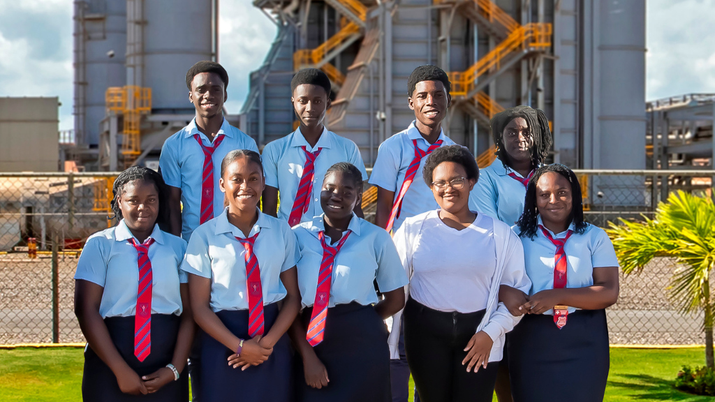 After touring NFE’s Combined Heat and Power Plant in Clarendon in preparation for their upcoming CAPE/CSEC examinations, students from Knox College posed outside the company’s LNG facility. In the photo are (back row L-R): Lejuan Blagrove, Roushawn Fearon and Darren James and (front row L-R): Shana-Kay Barrett, Amelia Gonzalez, Khadine White, Akeelah Green and Zonya Clarke.
 