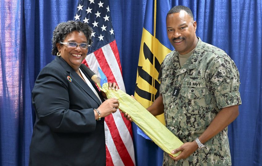 Barbados’ Prime Minister Mia Amor Mottley presents a gift to Deputy Commander of the United States Southern Command, Vice Admiral Alvin Holsey, following their courtesy call yesterday. (Photo credit: Prime Minister’s Office)