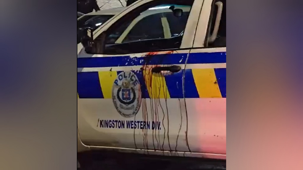 A screengrab from a clip of one of the police vehicles involved in the running gun battle with criminals in downtown Kingston early Wednesday morning.