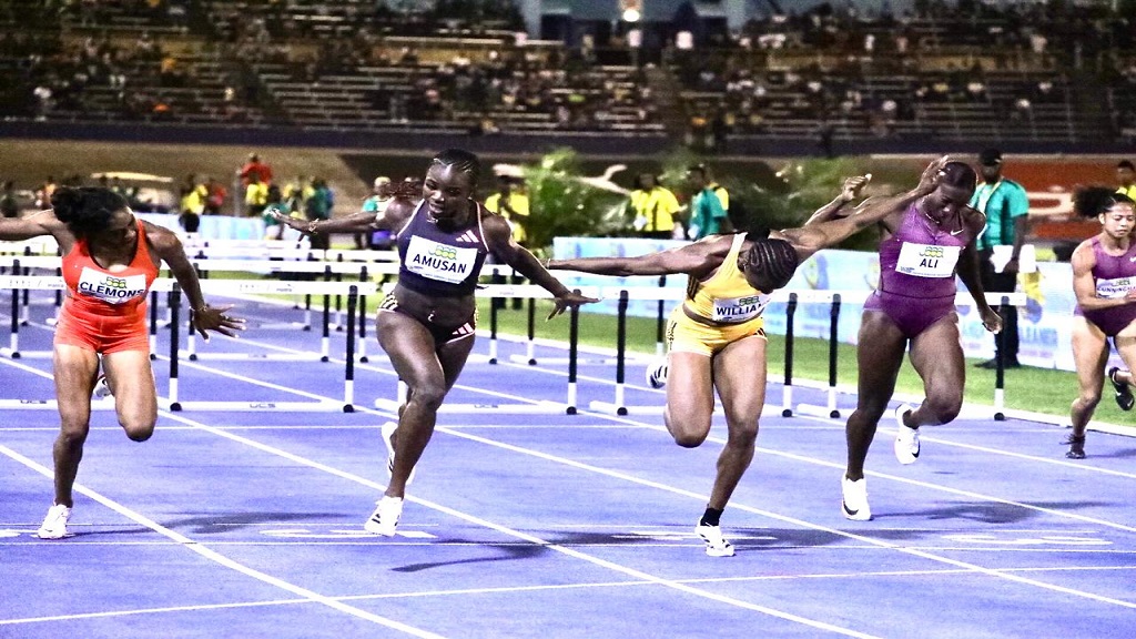 Nigerian world record holder Tobi Amusan (2nd left) beats Jamaica's Danielle Williams (3rd left) in the women's 100m hurdles at the first staging of the Jamaica Athletics Invitational at the National Stadium on Saturday, May 11, 2024. (PHOTO: Marlon Reid).