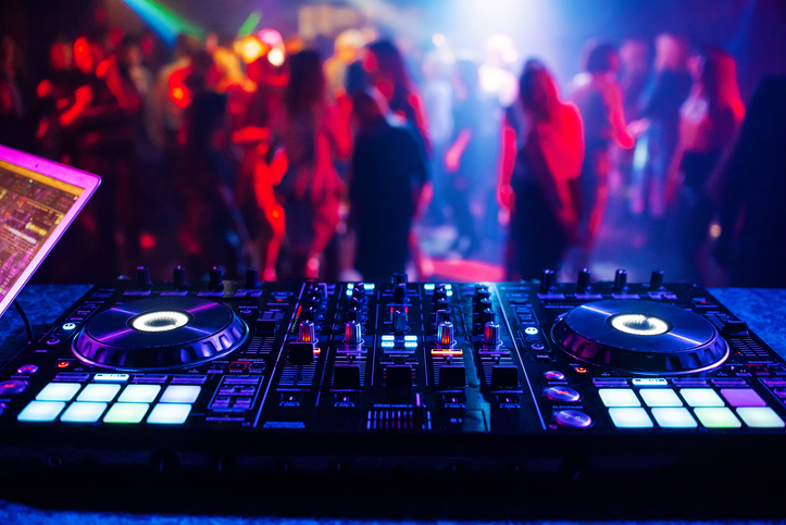 Music controller, DJ mixer in a night club at a party.  Photo: iStock