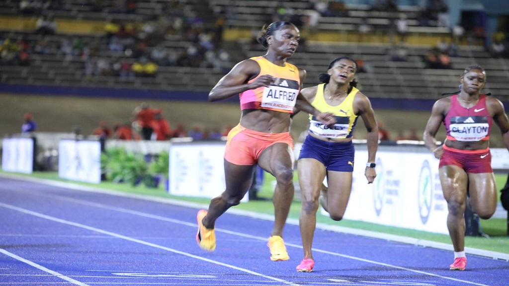 Julien Alfred (left) of St Lucia wins the women's 100m at the Racers Grand Prix on Saturday, June 1, 2024 at the National Stadium. (PHOTO: Marlon Reid).
