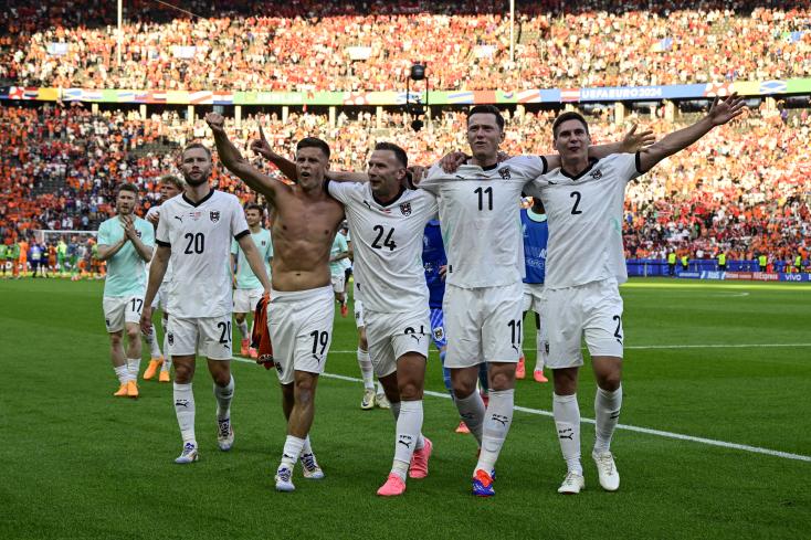 The Austrians exult after their decisive 3-2 victory against the Netherlands in Berlin, June 25, 2024 JOHN MACDOUGALL / AFP  