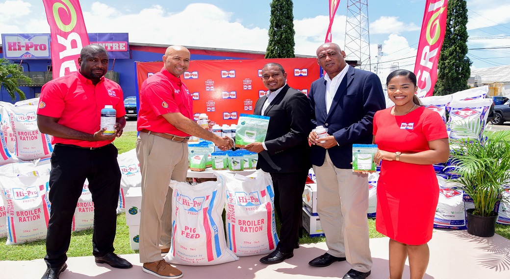 Minister of Agriculture, Fisheries and Mining, Floyd Green (centre), is presented with agricultural inputs to assist farmers affected by Hurricane Beryl, by Hi-Pro Vice President, Colonel (Ret'd) Jaimie Ogilvie (second left). Sharing in the presentation (from left) are Hi-Pro Divisional Sales and Distribution Manager, Trevin Nairne; Senior Strategist in the Ministry, Michael Pryce; and Hi-Pro Ace Supercenter Farm Store Manager, Sherrae Wong-Black.