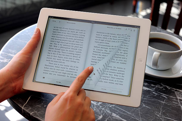 Person reading an e-book with an iPad. Photo: iStock