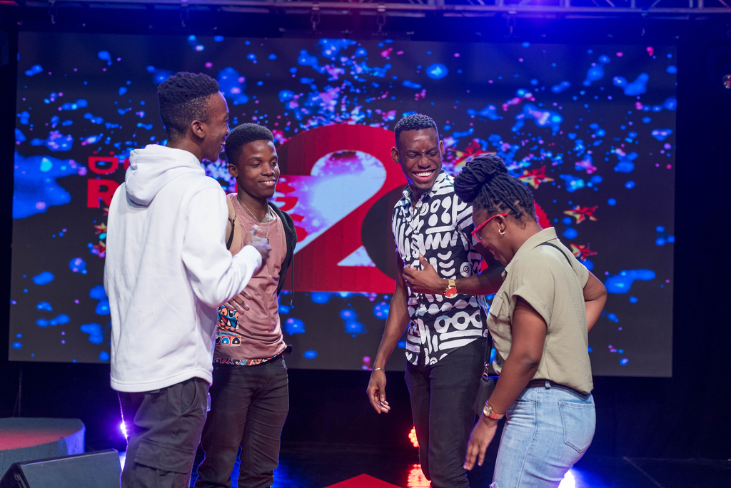 In a heartfelt conversation after the Digicel Rising Stars talent show, Kaylee Robinson (far right) shares in the excitement with fellow winners of the Digicel ‘20 for 20’ promotion. (From L-R): Jon-Marc Edwards, Tyrese Morgan, and Travis Rowe. 
