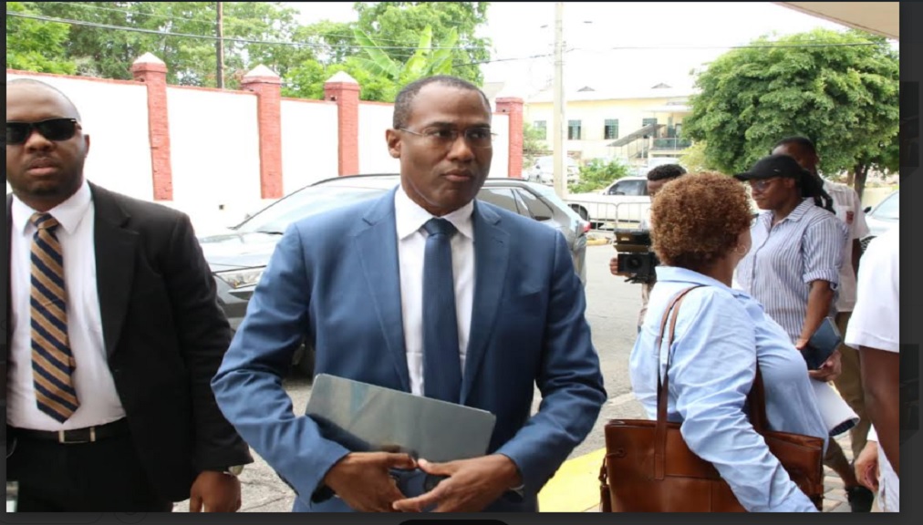 Dr Nigel Clarke arrives at Gordon House for his final appearance in parliament as minister of finance and public service in the Andrew Holness-led administration. 