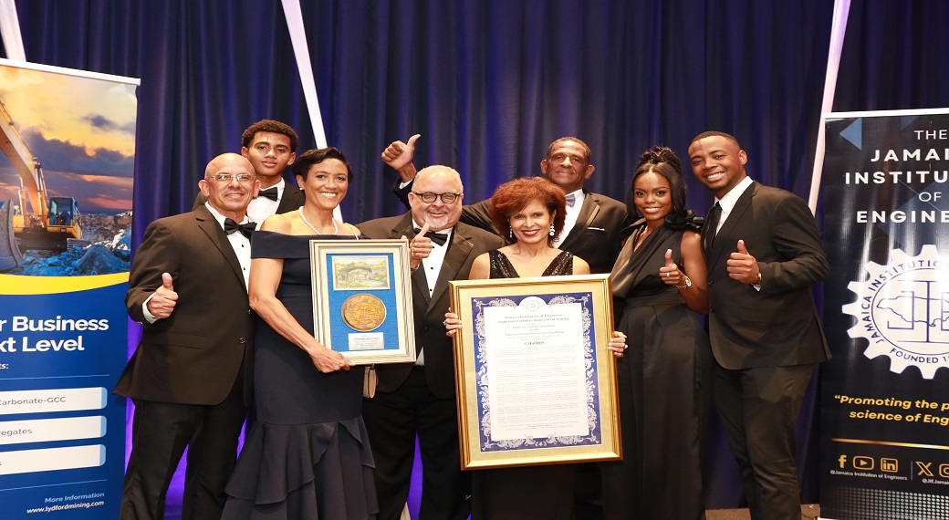 Lydford Mining Company celebrates winning the JIE Engineering Project of the Year Award for their innovative Engineered Sustainability in Limestone Mining initiative. Pictured are (front row, L-R): Edgar Cousins, Jackie Millington, PE, Peter Goldson, Lisa Cousins, Yeshika Kelly, and Joel McConnell; (back row, L-R): Matthew Warmington and Sam Millington.