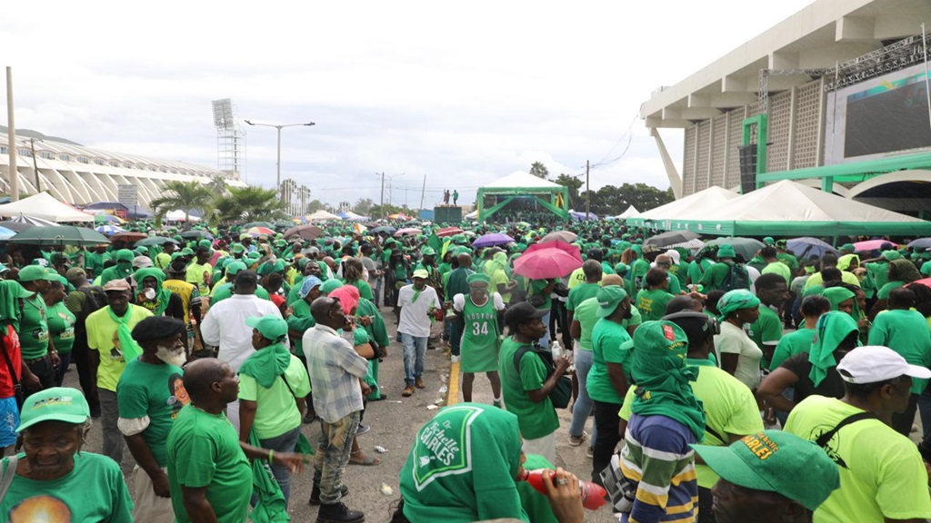 A section of the early crowd gathering outside the National Arena in St Andrew on Sunday for the Jamaica Labour Party's (JLP) 81st Annual Conference.