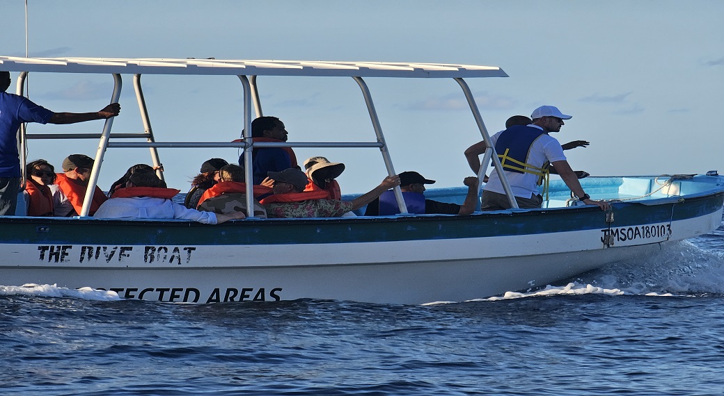 His Royal Highness, Crown Prince Haakon of Norway (right), during a boat tour of the Oracabessa Bay Fish Sanctuary in St Mary.