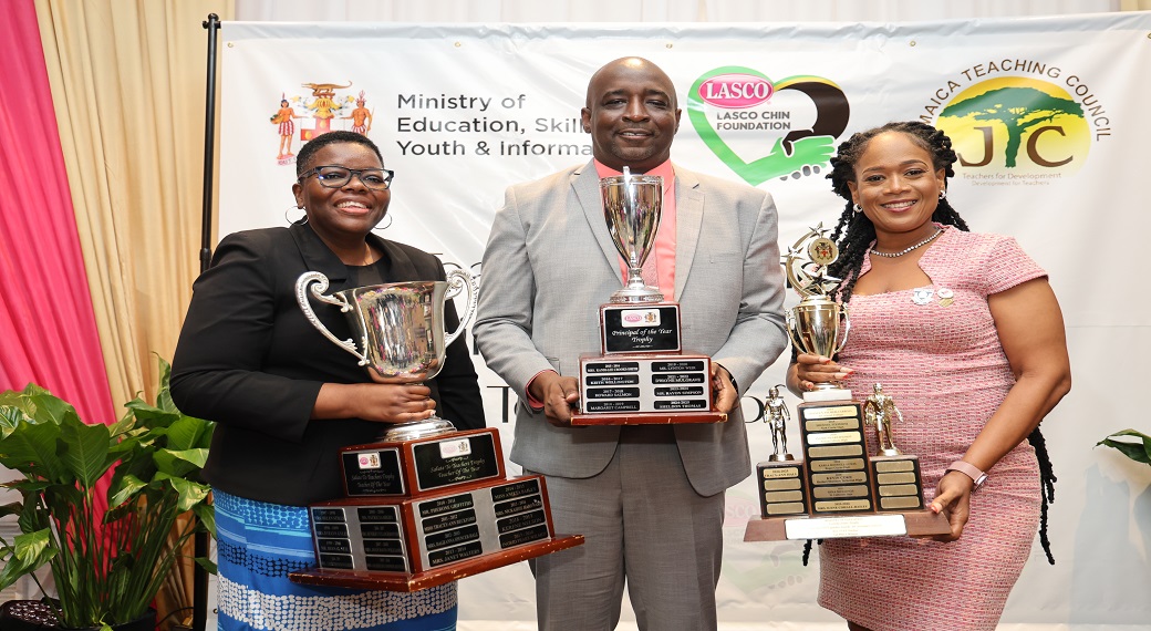 Sheldon Thomas, the 2024 LASCO/MoEY/JTC Principal of the Year is flanked by Casmina Bryan, the 2024 LASCO/MoEY/JTC Teacher of the Year and Tracy-Ann Hall, LASCO/MoEY/JTC TVET Teacher of the Year, as they celebrate the results of their resilience and excellence at the recent 2024 LASCO/MoEY/JTC awards ceremony.