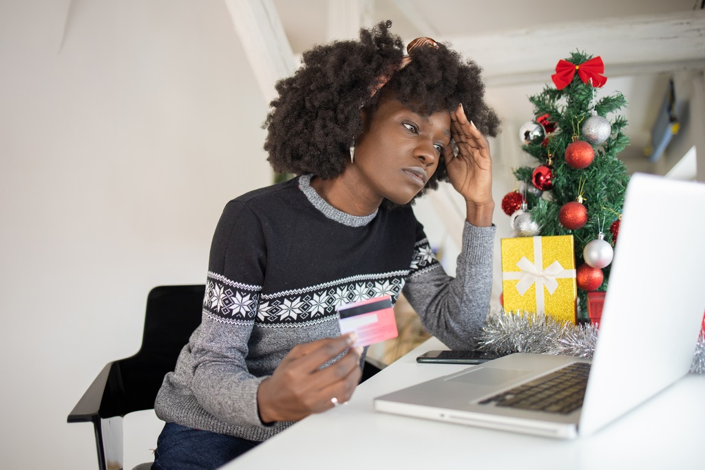 iStock photo depicting a woman shopping at Christmas.