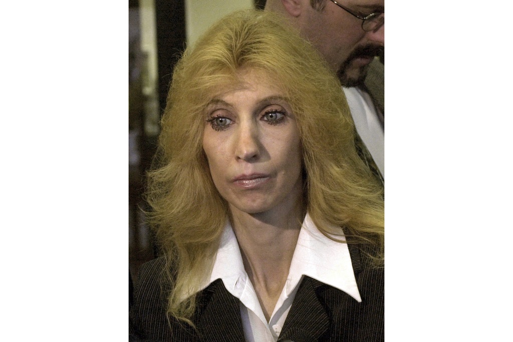 FILE - Debbie Nelson, mother of rap star Eminem, appears in Mount Clemens, Mich., on April 10, 2001. (AP Photo/Paul Sancya, File)  