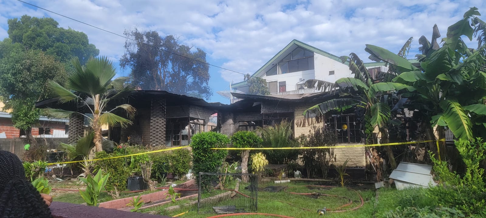 The aftermath of a tragic fire at the home of D'Abadie/O'Meara MP Lisa Morris-Julian. Photo: Nneka Parsanlal.