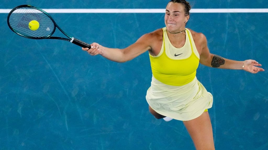 Aryna Sabalenka of Belarus plays a forehand return to Paula Badosa of Spain during their semifinal match at the Australian Open tennis championship in Melbourne, Australia, Thursday, Jan. 23, 2025. (AP Photo/Vincent Thian).
