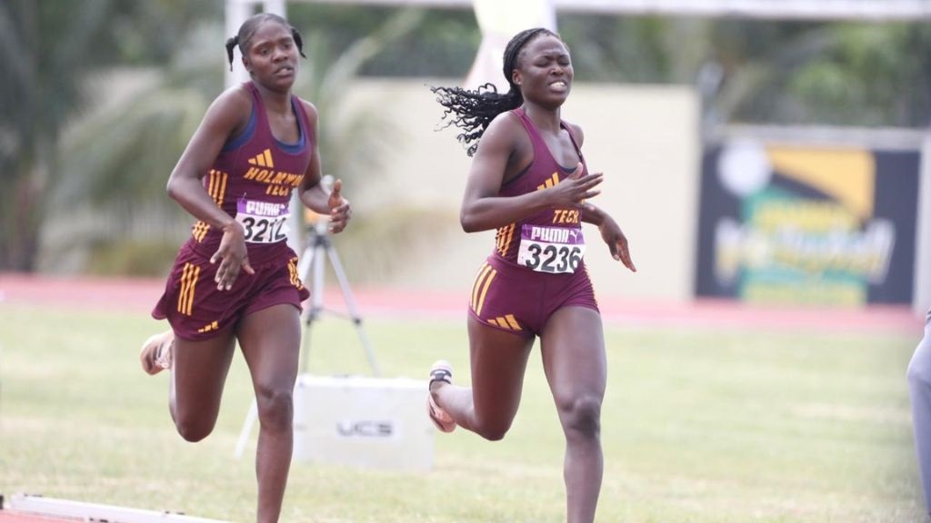 Holmwood Technical Ugandan athlete Florence Nafamba (right) beat her teammate Terrica Clarke in Section 2 of the Girls’ Class One 800m at the JAAA/Puma Fuller/Anderson Development Meet at GC Foster College on Saturday, January 11, 2025. Nafamba won with a time of 2:15.99, the fastest time across the two sections. (PHOTO: Marlon Reid).