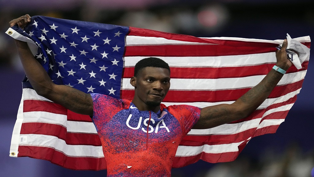 Fred Kerley, of the United States, poses after winning the bronze medal in the men's 100 metre final at the 2024 Summer Olympics, Sunday, Aug. 4, 2024, in Saint-Denis, France. (AP Photo/Ashley Landis, File).