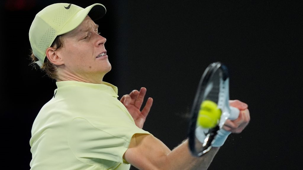 Jannik Sinner of Italy plays a forehand return to Ben Shelton of the U.S. during their semifinal match at the Australian Open tennis championship in Melbourne, Australia, Friday, Jan. 24, 2025. (AP Photo/Asanka Brendon Ratnayake).
