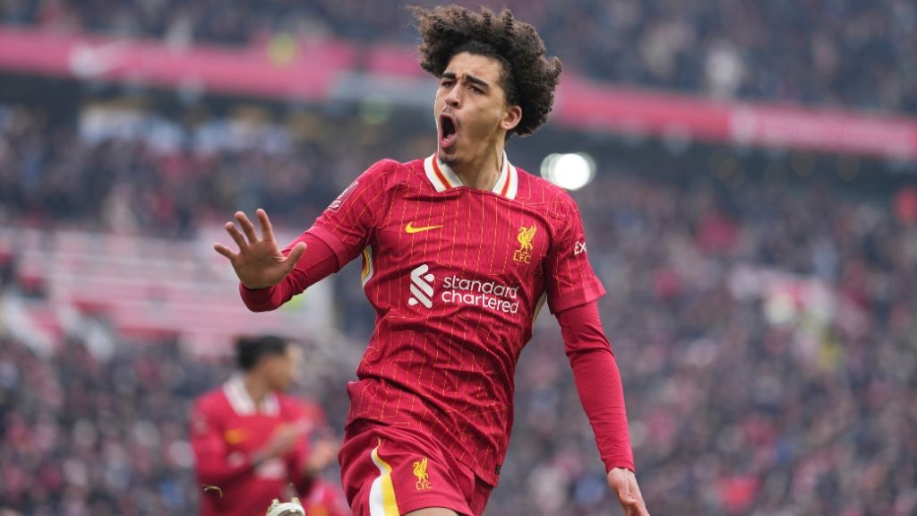 Liverpool's Jayden Danns celebrates after scoring his side's third goal during the FA Cup football match against Accrington Stanley at the Anfield stadium in Liverpool, England, Saturday, Jan. 11, 2025. (AP Photo/Jon Super).