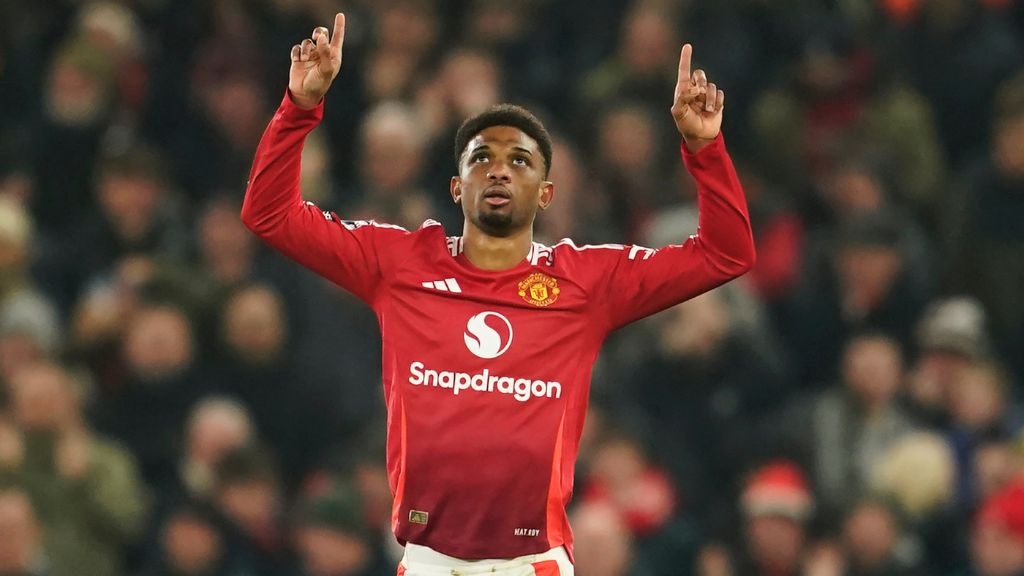 Manchester United's Amad Diallo celebrates after scoring his side's first goal during the English Premier League football match against Southampton at the Old Trafford stadium in Manchester, England, Thursday, Jan. 16, 2025. (AP Photo/Dave Thompson).
