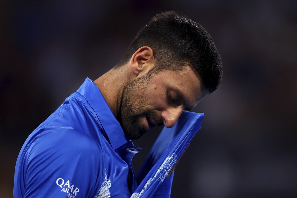 Serbia's Novak Djokovic reacts during his match against France's Gael Monfils at the Brisbane International in Brisbane, Australia, Thursday, Jan. 2, 2025. (AP Photo/Pat Hoelscher)
