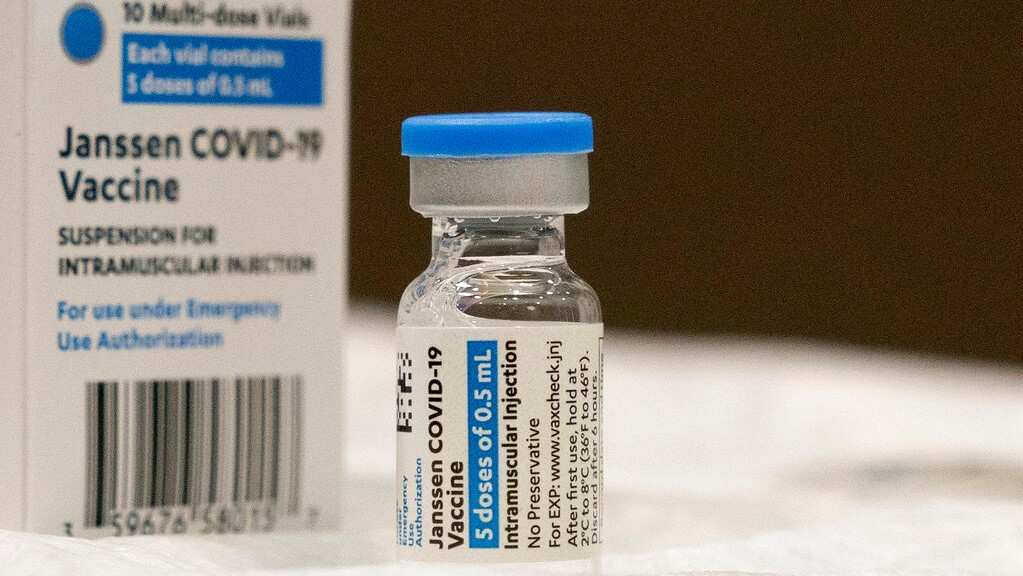 A vial of the Johnson & Johnson COVID-19 vaccine is displayed at South Shore University Hospital in Bay Shore, NY With the US pause of the vaccine, authorities are weighing whether to resume the shots the way European regulators decided to, with warnings of a “very rare” risk. New guidance is expected late Friday, April 23, after a government advisory panel deliberates a link between the shot and a handful of vaccine recipients who developed highly unusual blood clots. (AP Photo/Mark Lennihan, File)