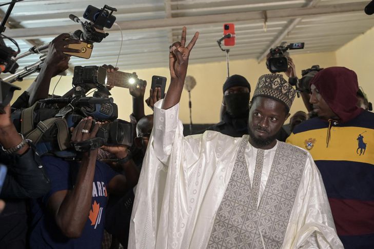 Senegal's youngest president takes oath in front of his African peers