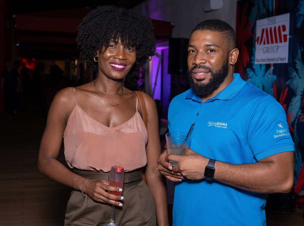 Tameisha Hitchins, Wealth Advisor at Sagicor Investments Jamaica and Javed Jackson, Manager and Treasurer at Sagicor Group Jamaica, pose for the lens at JMMB Group's recent corporate mixer 