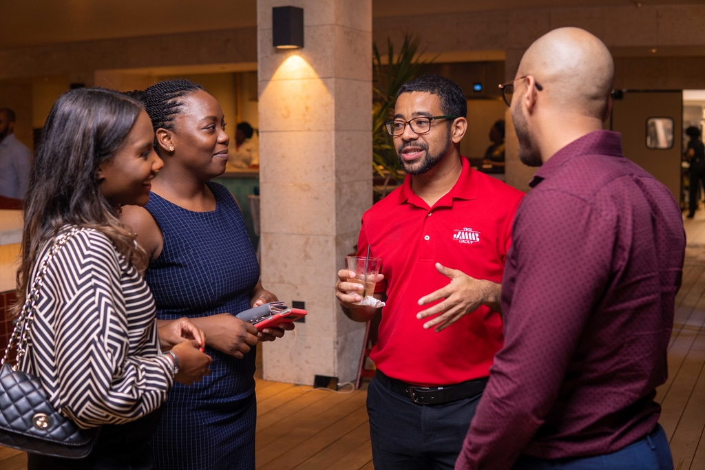 Ryan Chung (second from right), Manager, Debt, Capital Markets Unit at JMMB Group at the recent JMMB Group's Corporate Mixer called 
