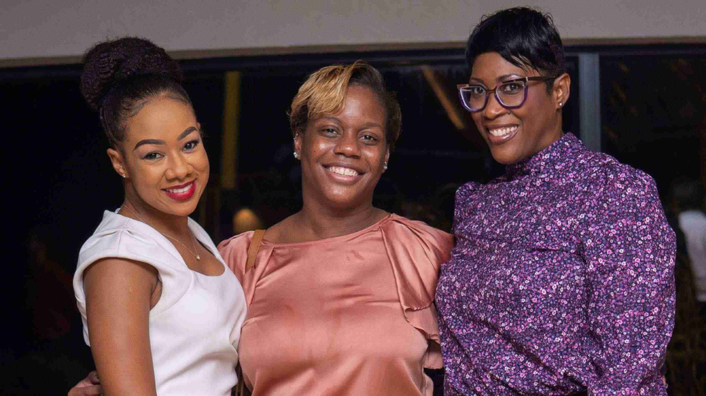 (From left) Shinelle Simpson, Corporate Relations Manager at JMMB, Simone Brown, Assistant Manager at Asset Management Unit Scotia Investments Jamaica, and Rosemarie Smith-White, Manager at Local Treasury at JMMB Bank, seek a lens. to pause. Recently, her time at JMMB Group's corporate her mixer called 