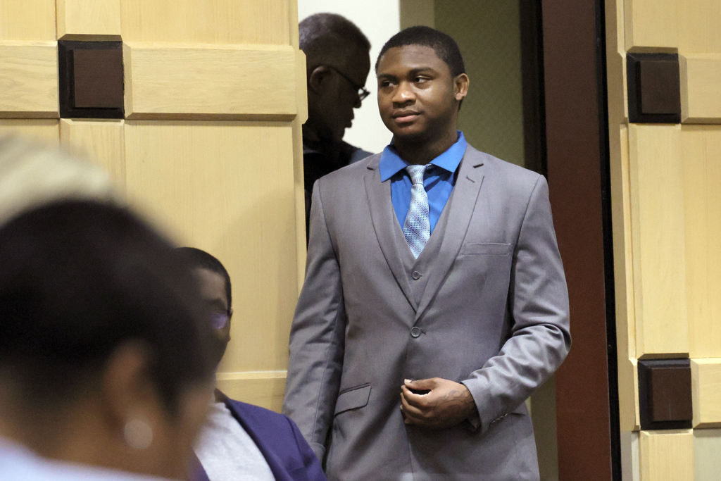 Suspected shooting accomplice Trayvon Newsome enters the courtroom while the jury deliberates in the XXXTentacion murder trial at the Broward County Courthouse in Fort Lauderdale, Fla., Friday, March 10, 2023. Emerging rapper XXXTentacion, born Jahseh Onfroy, 20, was killed during a robbery outside of Riva Motorsports in Pompano Beach in 2018, allegedly by defendants Michael Boatwright, Newsome and Dedrick Williams. (Mike Stocker/South Florida Sun-Sentinel via AP, Pool) 