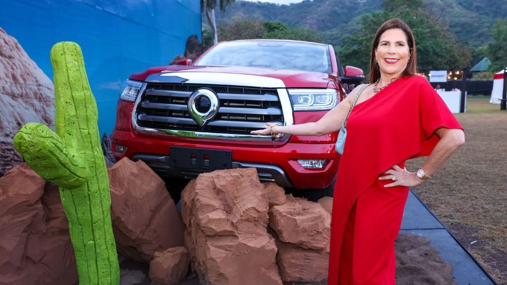 Managing Director of Stewart’s Automotive Group, Jackie Stewart Lechler poses infront of the GWM P-Series pickup truck.