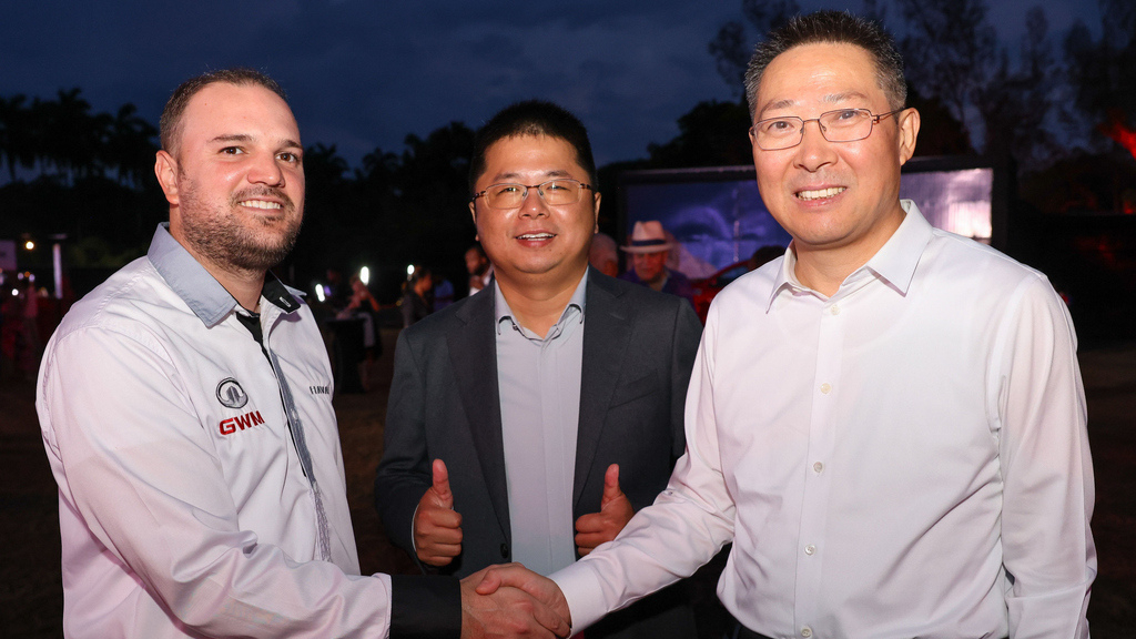 Brand Manager at Stewarts Automotive Group, Timothy Stewart shares a moment with GWM Sales and Marketing Director, Zhou Jing (centre) and Chinese Ambassador to Jamaica, H.E. Chen Daojiang during the launch of the new GWM Havals held at the Hope Botanical Gardens in Kingston on May 13. 