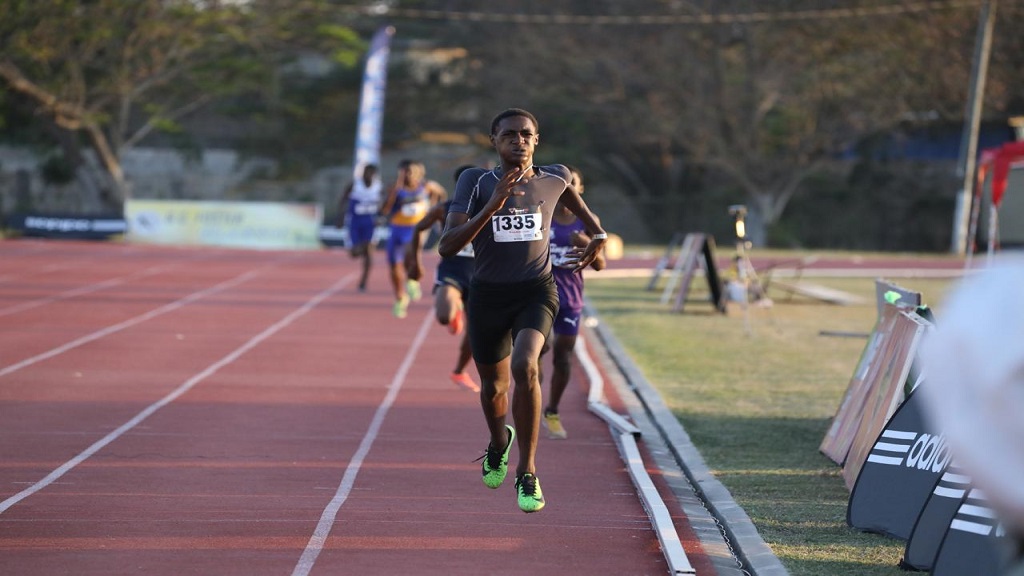 Deshawn Banton from Mile Gully competes in heat three of the Boys' Class Two 800m, winning with a personal best time of 2:06.61. He finished 15th overall in the event.