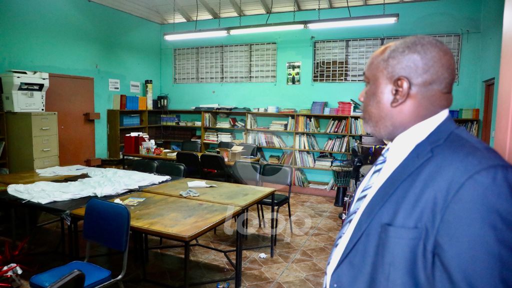 Maverley Primary and Infant School principal takes the Loop team on a tour of the school. (Photo: Marlon Reid)