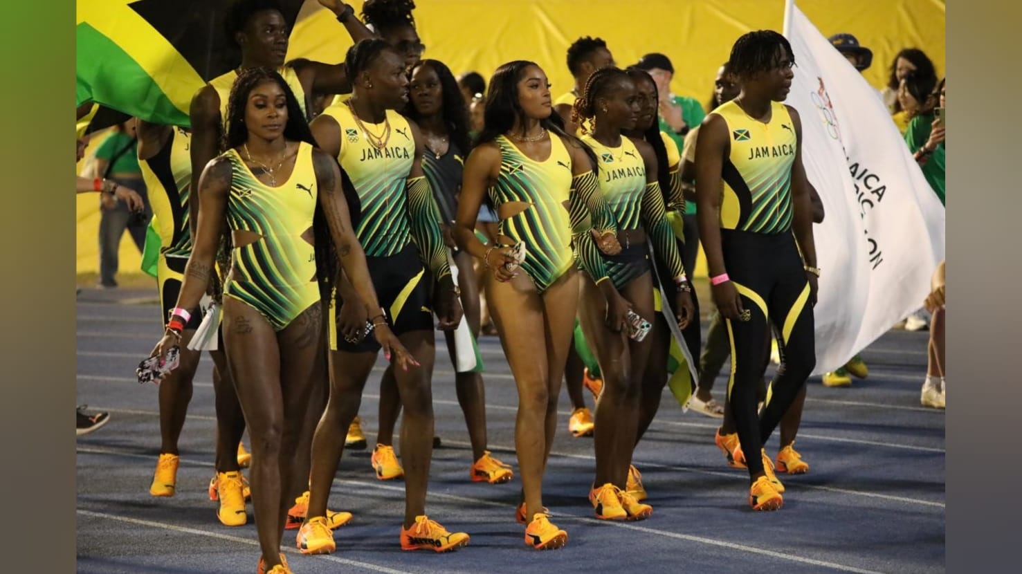 Double, double Olympic Champion, Elaine Thompson-Herah (left), World U-20 Triple Jump Champion Jaydon Hibbert (third left) and Stacey Ann Williams are among the athletes who took to the track at the National Stadium in Kingston on Saturday to showcase the Paris Olympics 2024 kit for Jamaica that was unveiled by sports manufacturer Puma. (Photo: Marlon Reid)