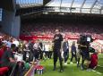 Liverpool's manager Jurgen Klopp greets supporters ahead the English Premier League football match against Wolverhampton at Anfield Stadium, in Liverpool, England, Sunday, May 19, 2024. (AP Photo/Jon Super).